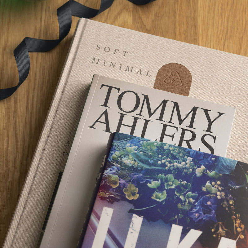 A signed copy of Tommy Ahlersl's Uperfekt & a personalised bookmark